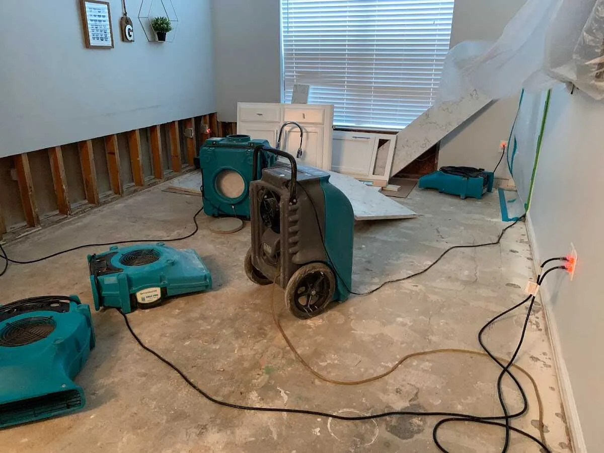 Dehumidifier in flood-cut room for Water Damage Restoration in Auburn Hills
